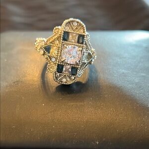 Elegant Gold and Silver Ring with Blue Accents